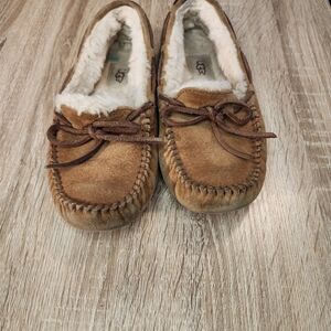 UGG Women's Dakota Moccasin Slippers in chestnut brown suede